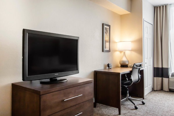 View of TV and Desk in the Standard Suite Room